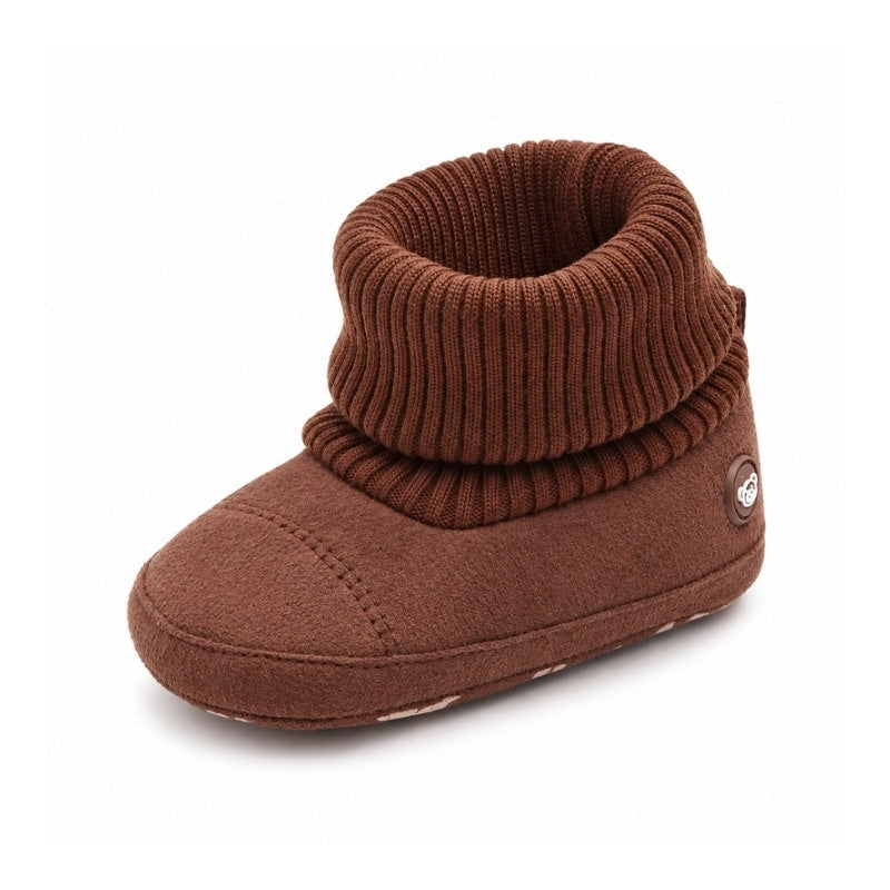 Bruna babytossor med ribbad mudd och rundad suldel