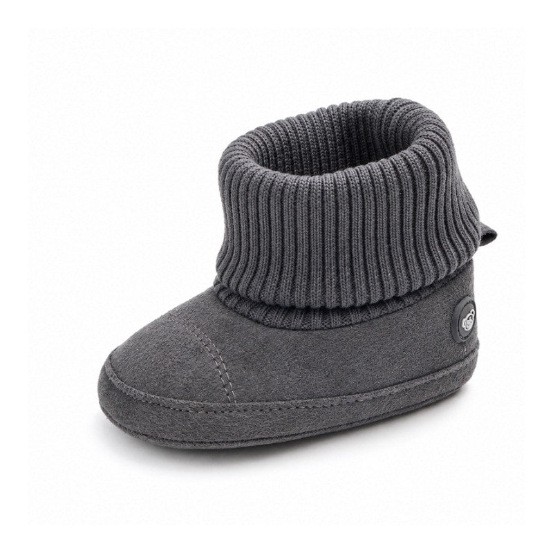 Mörkgrå babytossor med ribbad mudd och sömdetaljer framtill