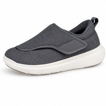 Ergonomisk grå slip-on-sko i textil med vadderad häl och stötdämpande sula
