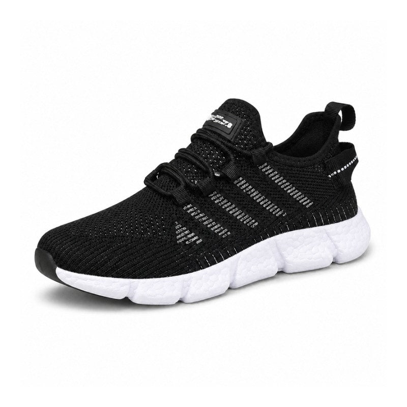 Svarta lätta sneakers i ventilerande mesh med vit sula och kardborreflik