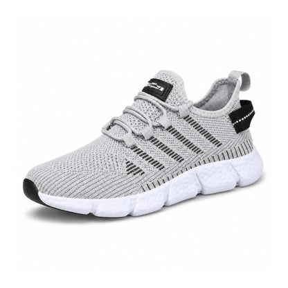 Grå lätta sneakers i ventilerande mesh med vit sula och svart logodetalj