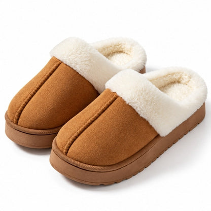 Slip-on-tofflor i brun med vit fuskpäls runt öppningen och kantad sula