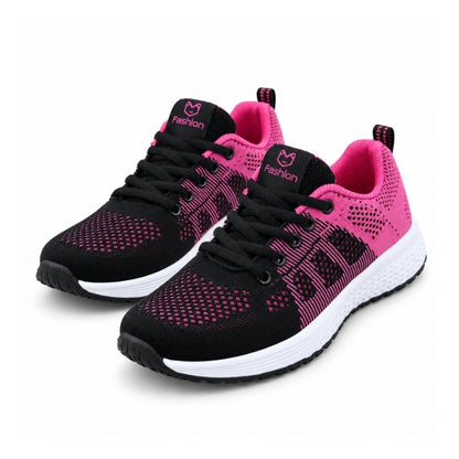 Mörka textilsneakers för dam med snörning, rosa mönster och vit sula.