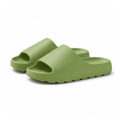 Gröna slip-on-tofflor med kraftig sula och öppen häl