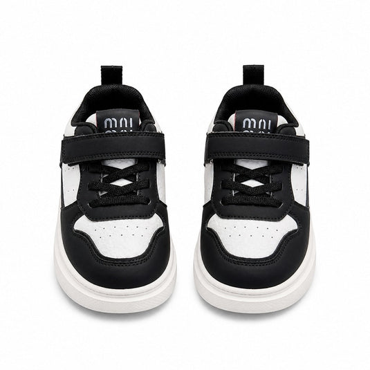 Svarta och vita sneakers för barn med kardborreband och snördetalj