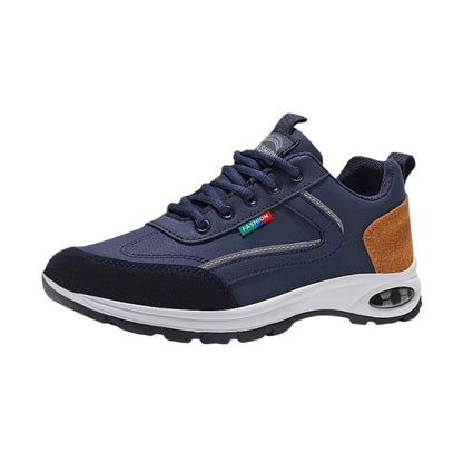 Sneakers i mörkblått med brunt inslag och luftdämpad sula