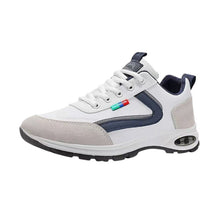 Sneakers med vit ovandel, marinblå detaljer och luftdämpad sula