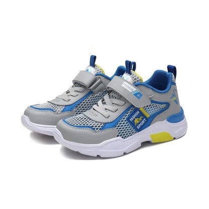 Grå och blå barnsneakers med kardborreband, textilmönstrad ovandel och vit sula