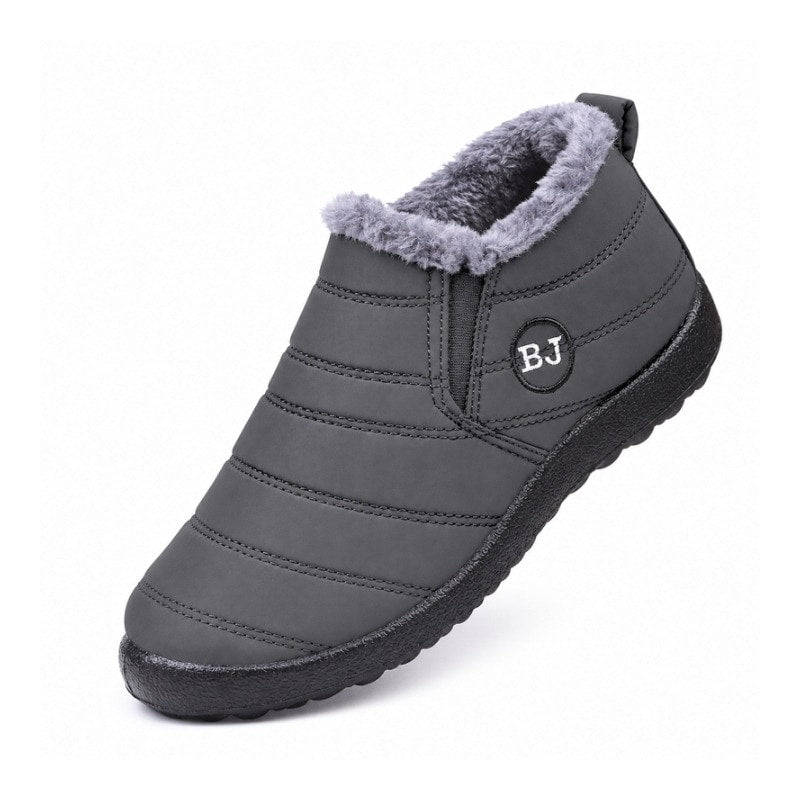 Varmfodrade slip-on skor i mörkgrå med grå pälskant och vadderad sula