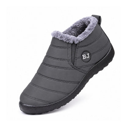 Varmfodrade slip-on skor i mörkgrå med grå pälskant och vadderad sula
