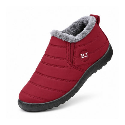 Varmfodrade slip-on skor i röd med grå pälskant och svart, stötdämpande sula