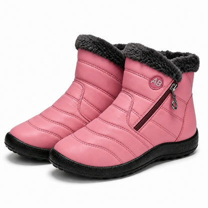 Varmfodrade vinterkängor i rosa med dragkedja och fuskpäls vid skaftet